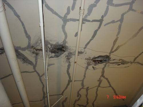 Under a pond, a 20 foot section had over 200 linear feet of cracks and 10 feet of overhead spalling.
