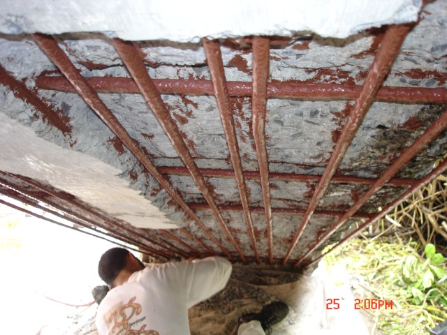 Treating rebar helps prevent the corrosion which spalled the concrete.