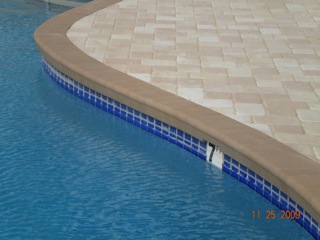 Pavers make a beautiful and durable pool surround